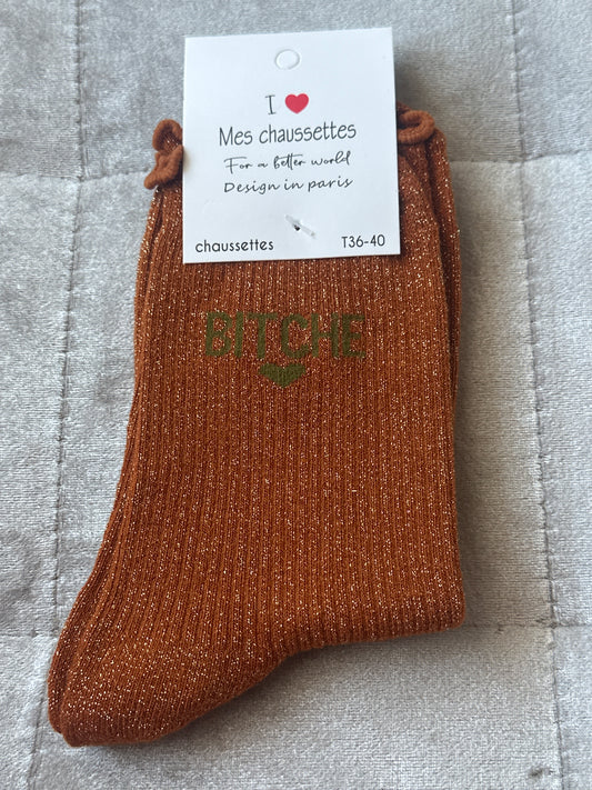 Chaussettes pailletées message « bitche »