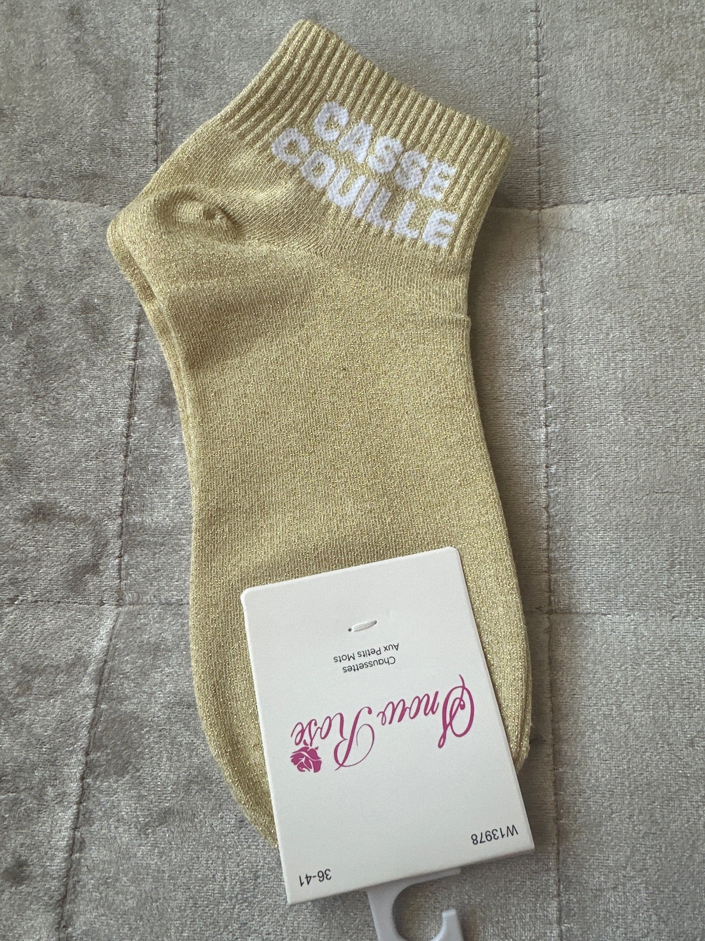 Socquettes pailletées message « casse couille »