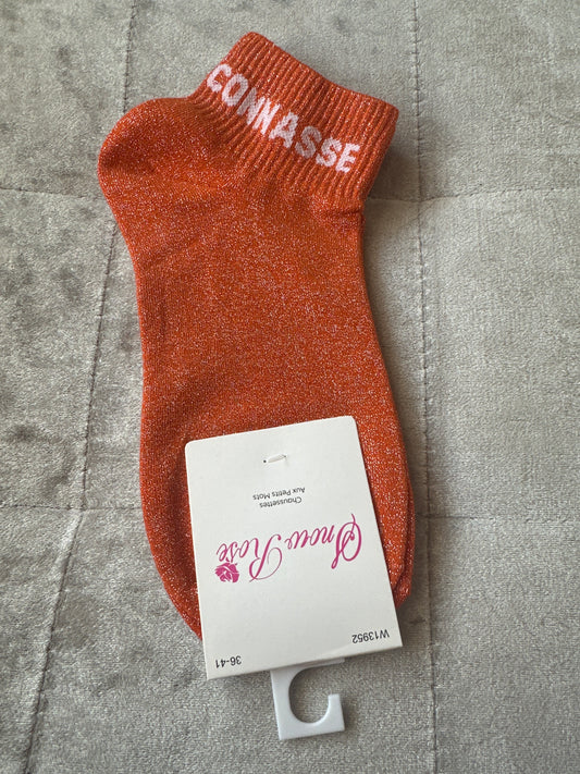 Socquettes pailletées message « connasse »